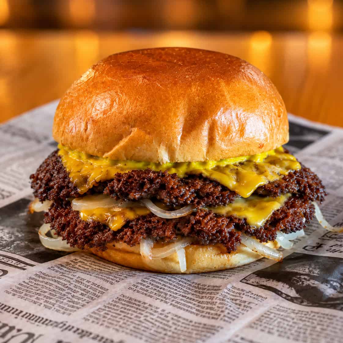 Oklahoma Smash burger with onion-smashed beef patties, American cheese and housemade mustard relish at Wilson’s Bar & Grill in Hilliard, Ohio.