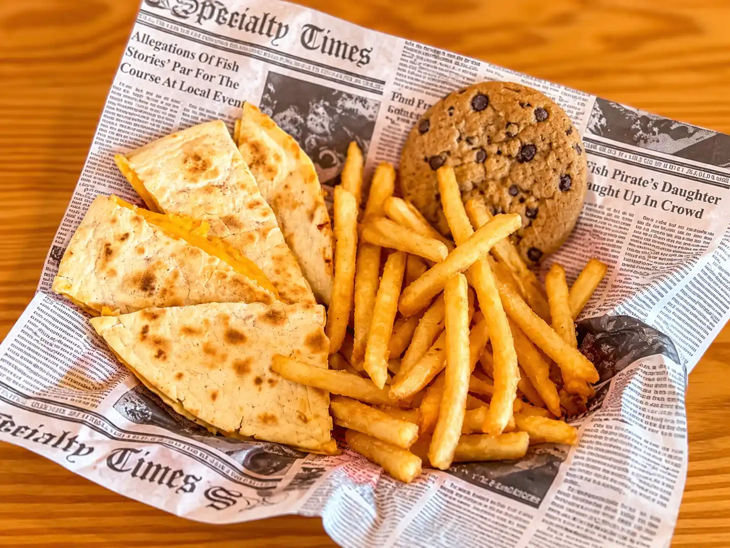 Kids cheese quesadilla with fries and a cookie at Wilson’s Bar & Grill in Hilliard, Ohio