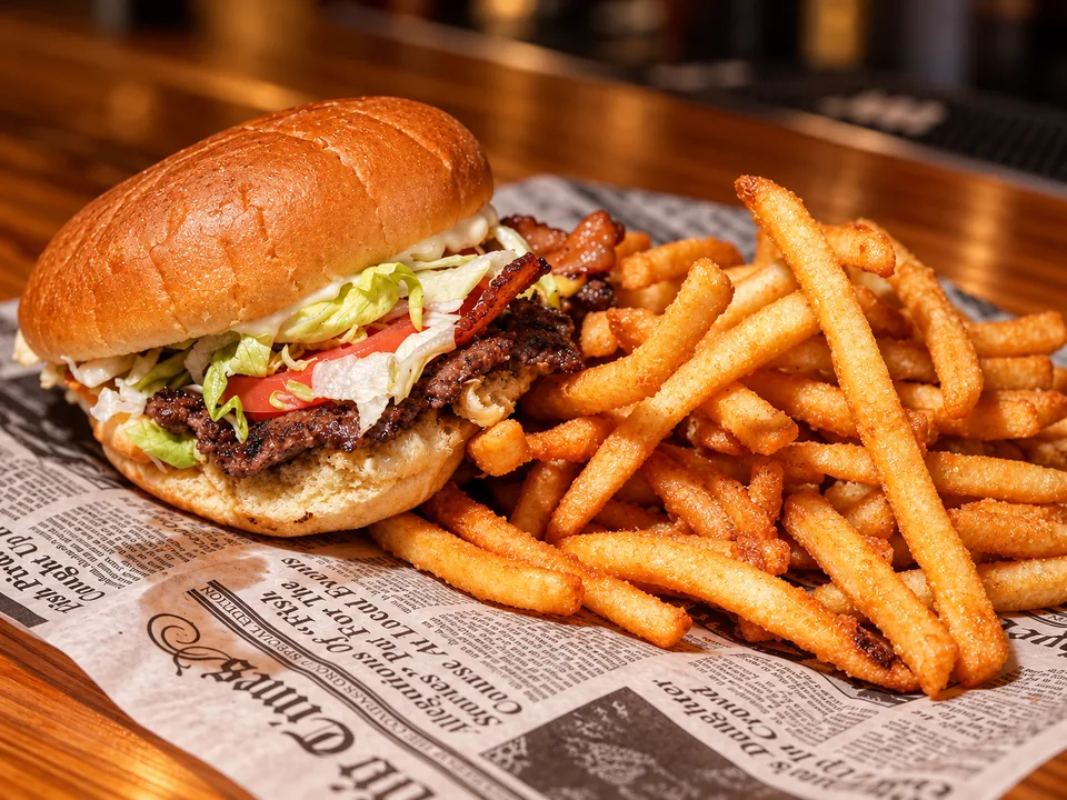 Jr. Bacon Smash burger with fries at Wilson’s Bar & Grill
